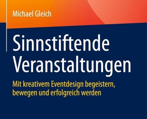 Buchdeckel mit abstrakten orangefarbenen und gelben Formen im oberen Bereich. Titel auf Deutsch: "Sinnstiftende Veranstaltungen". Untertitel: "Mit kreativem Eventdesign begeistern, bewegen und erfolgreich werden." Autor: Michael Gleich. Verlag: Springer Gabler.